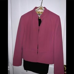 A pink and black pants and jacket suit